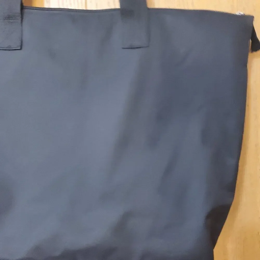 Disney's The Lion King with a Spacious Black Broadway Musical Zip Tote Bag!